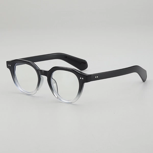 Retro round frame glasses with black gradient design and silver rivets on the side