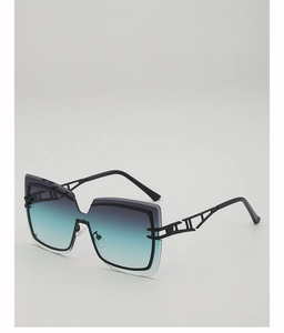 Close-up of oversized square sunglasses with blue-grey gradient lenses and hollow metal temples