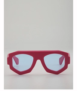 Vue détaillée des lunettes de soleil géométriques roses avec verres bleu clair