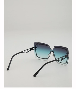 Detailed view of square gradient blue sunglasses with hollow geometric metal temples