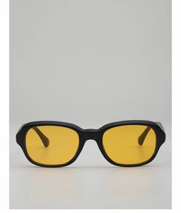 Lunettes de soleil rétro à monture ovale noire et verres jaunes pour un style moderne