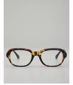 Détail de montures de lunettes vintage en écaille avec design carré ambre de qualité