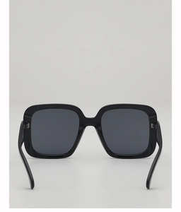 Front view of classic black oversized square sunglasses with glossy frames and dark lenses