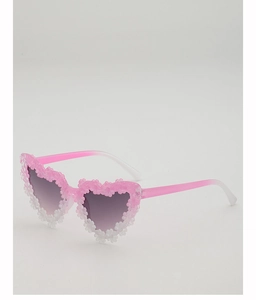 Close-up of heart-shaped kids sunglasses with 3D flower frame and purple gradient lenses