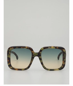 Front view of large square oversized sunglasses with artistic tortoiseshell texture frames