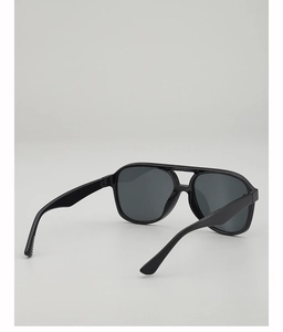 Detail shot of black aviator sunglasses with thick frames and dark polarized lenses