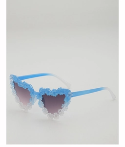 Detail of heart-shaped sunglasses with blue and white floral decor on the frame