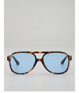 Detail of tortoise frame and light blue lenses on retro double bridge aviator sunglasses
