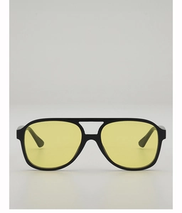 Front view of pilot sunglasses with a black double-bridge frame and transparent yellow lenses