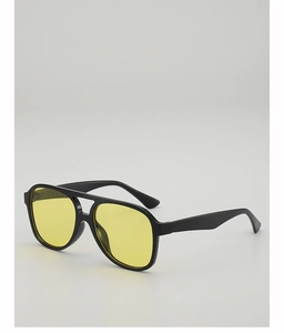 Detail of vintage square sunglasses with black frame and yellow lenses with double bridge