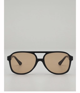 Detail of vintage pilot sunglasses with double bridge and brown translucent lenses