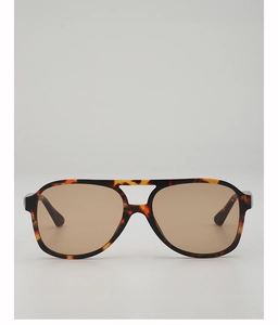 Close-up of tortoise shell aviator sunglasses with brown lenses and double bridge detail