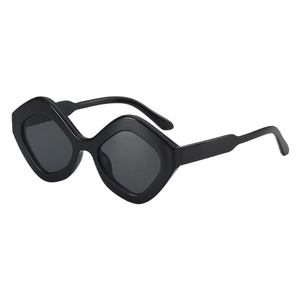 Lunettes de soleil noires géométriques irrégulières surdimensionnées avec finition polie