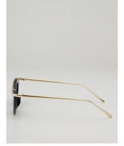 Side view of retro cat eye sunglasses featuring black frames and gold metal temples