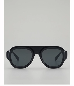 Front view of vintage pilot sunglasses with thick black frames and dark grey lenses
