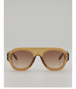 Front view of amber resin aviator sunglasses with brown gradient lenses and flat top