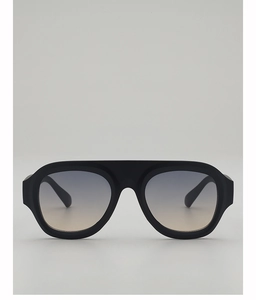 Front view of retro aviator sunglasses with black thick frames and gradient lenses