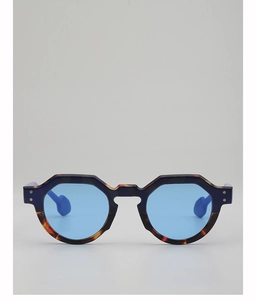 Front view of retro round sunglasses with blue frames and tortoiseshell accents