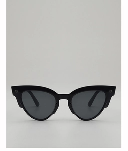 Close-up of black oval sunglasses with stylish square metal accents on the temples