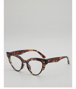 Detail of tortoiseshell cat-eye glasses with silver cross-shaped metal ornaments