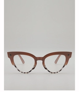 Close-up of retro oval cat-eye sunglasses featuring leopard print and brown gradient frames