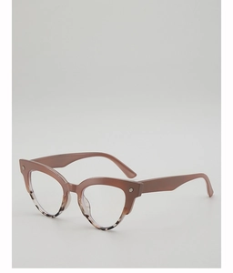 Close-up of tortoise shell oval sunglasses with decorative silver cross on the temples