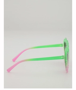 Detail view of heart-shaped sunglasses with green pink gradient and beaded frame