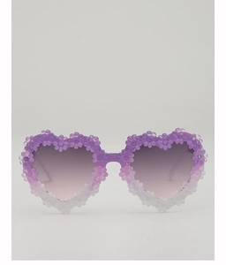 Close-up of purple gradient heart sunglasses with decorative 3D floral accents