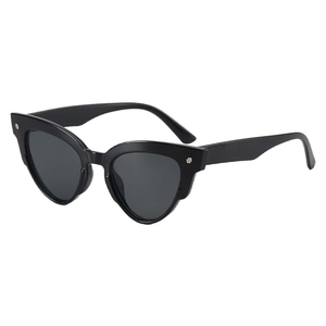 Retro black cat-eye sunglasses for women with oval frames and silver cross rivets