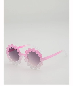 Close-up of daisy shaped kids sunglasses with pink to white gradient flower frame