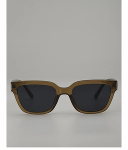 Detailed view of square brown tortoiseshell sunglasses with dark lenses and silver metal hinges