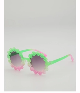 Detail of flower frames and gradient lenses on cute daisy sunglasses for kids