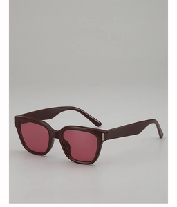 Detail view of square frame sunglasses with dark wine red frame and red tinted lenses