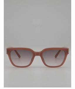 Detail of pink square frame sunglasses with gradient grey lenses and silver metal hinges