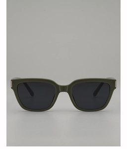 Macro shot of olive green square sunglasses featuring silver metal corner accents