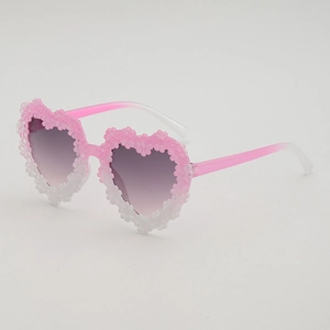 Sweet heart-shaped kids sunglasses with gradient pink daisy floral frames and purple lenses