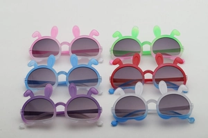 Detailed grid view of six colorful cartoon bunny sunglasses for kids with 3D rabbit ears
