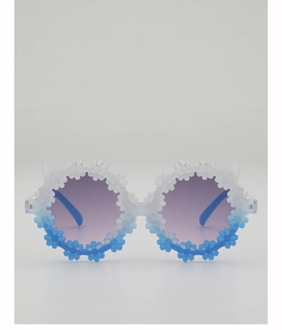 Detail view of cat-ear children's sunglasses with blue gradient frames and floral decor