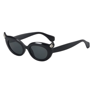 Cat eye sunglasses with devil horn design and silver studs in classic black finish