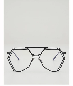 Vista frontal de monturas de gafas negras hexagonales irregulares con doble puente modernas