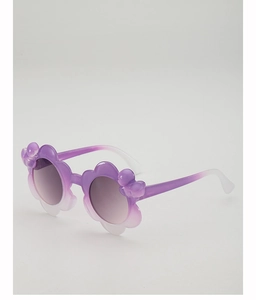 Macro detail of purple gradient flower-shaped sunglasses with cute 3D bow on frame