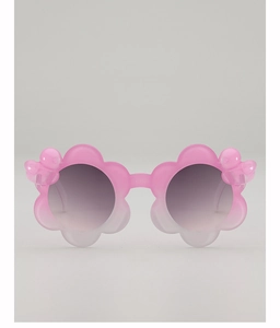 Front detail of pink flower-shaped kids' sunglasses with gradient frame and grey lenses
