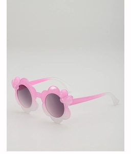 Detail of flower-shaped kids sunglasses with pink gradient frames and bow accents