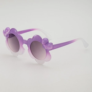 Flower shaped kids sunglasses with purple gradient frames and 3D bow details