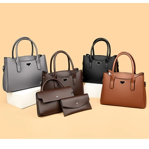 Litchi texture leather tote and envelope bag set with triangle metal detail