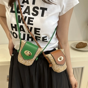 Mini woven crossbody bag in green and brown with leather flap and metal clasp