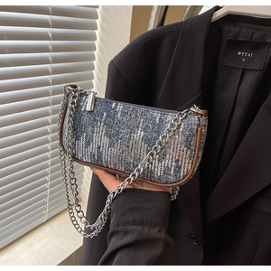 Sequin denim shoulder bag with silver chain strap and retro skyscraper landscape pattern