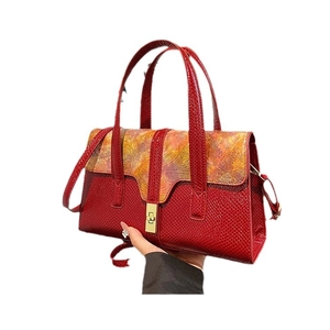 Red embossed faux crocodile leather handbag with vintage floral flap and metal lock