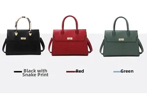 Detailed view of structured leather handbags in black snakeskin, red and green with gold locks