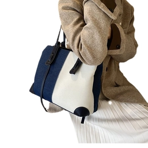 Large capacity denim tote bag with blue and white patchwork for shoulder and handbag use